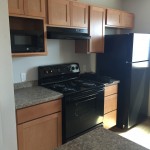 Building B kitchen range and fridge Building B kitchen range fridge